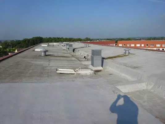 Aufnahme der Dachsanierung der Wohnsiedlung Röbel mit Enkopur